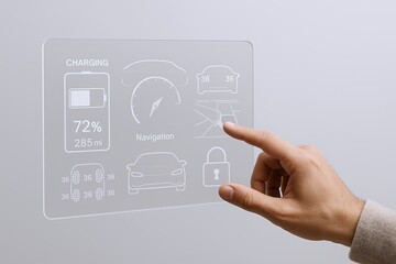 Futuristic transparent digital car dashboard interface with hand interacting with control panel.