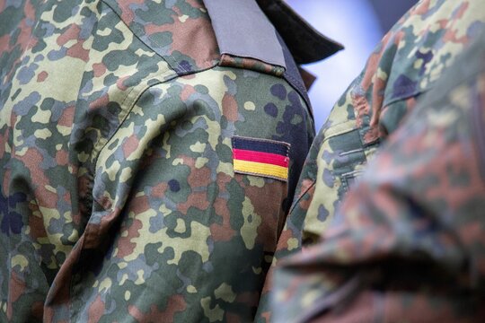 Bundeswehr symbol image: Close-up of the German flag on the Bundeswehr uniform