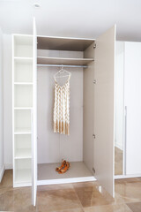 Open Wardrobe with Dress and Shoes