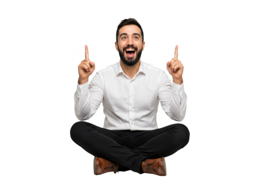 An excited man in a white shirt sits crosslegged and points upwards with both index fingers, isolated on a transparent background - Powered by Adobe