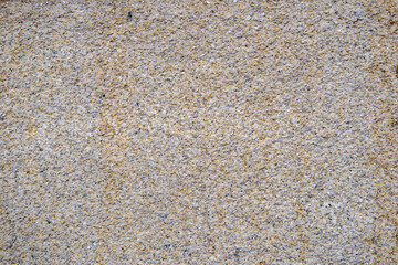 abstract texture of natural grey and brown speckled granite stone