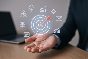 Businessman Hand Holding Digital Target with Graph Icons and Data Analytics.