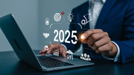 A professional business photo showing hands interacting with a modern laptop computer.