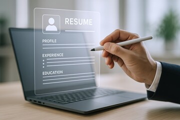 Modern digital resume interface on laptop screen with hand holding stylus pen in bright office environment.
