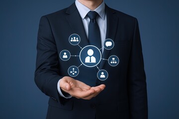 Businessman in suit holding digital network icons representing connection and communication.