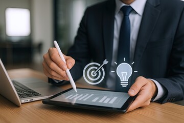Professional businessman in formal suit using digital tablet for data analysis and vision planning.