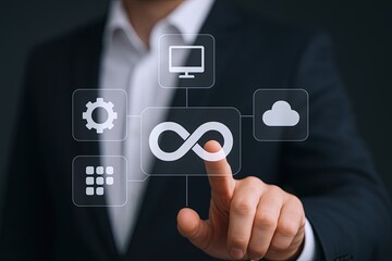 Businessman in formal suit interacting with digital interface displaying technology icons and infinity symbol.