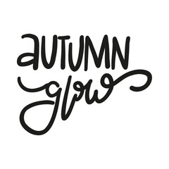 Elegant hand-lettered phrase "Autumn Glow" in modern calligraphy style. Perfect for seasonal design, fall decor, and greeting cards.  