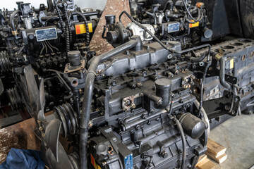 Diesel engine under repair in workshop, industrial machinery, mechanical parts, engineering maintenance and heavy vehicle service concept.