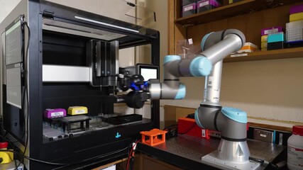 Independent robot arm in the laboratory working with chemicals, medicine - Powered by Adobe