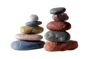 Balanced colorful stones create zen stone towers on transparent background for wellness and meditation art