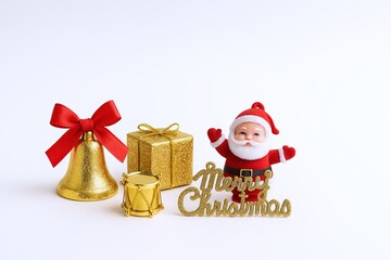 Festive Christmas decorations with bell gift box Santa snowman and "Merry Christmas" sign.