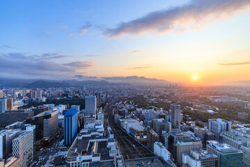 Obraz premium Hokkaido, JapanBeautiful Sunrise Over Sapporo City Skyline in Hokkaido Japan