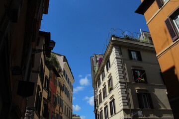 Cozy old street in Trastevere in Rome, Italy. Trastevere is rione of Rome, on the west bank of the Tiber in Rome, Lazio, Italy. Architecture and landmark of Rome Traditional ¨Rome buildings and houses