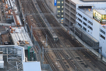 Urban Railway Tracks and Cityscape View from Above in Sapporo, Hokkaido, Japan