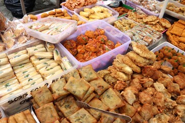 Traditional Indonesian snacks such as tofu, risoles, martabak, Solo-style sausage roll or sosis solo, and bakwan. These savory and crispy fried treats offer an authentic taste of Indonesia.