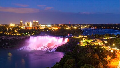 Night view of illuminated Niagara Falls and city skyline
