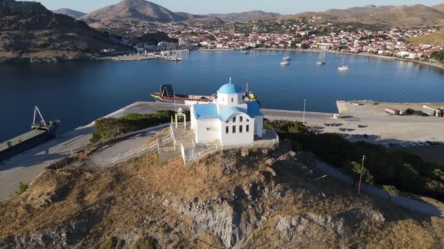 The church of Agios Nicholaos with the town of Myrina at the background at the Greek island of Lemnos in the northern Aegean Sea.