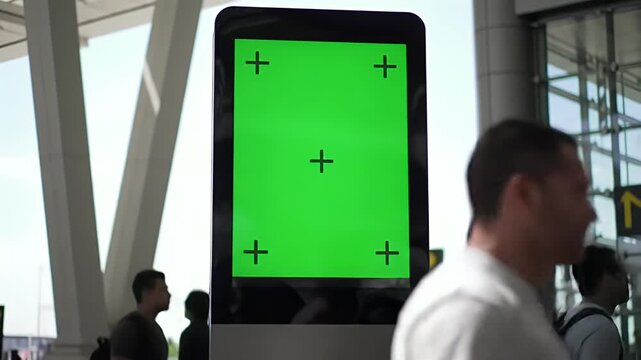 Green Screen Digital Display with Tracking Markers in Modern Public Space for Advertising Mockups