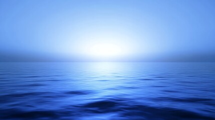 Fototapeta premium Calm Ocean at Sunrise with Blue Water and Sky Reflection