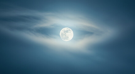 Obraz premium Celestial Orb: A captivating shot showcases the moon, radiating a soft, ethereal glow. A captivating shot showcases the moon, radiating a soft, ethereal glow.