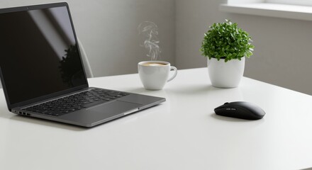 Modern workspace featuring laptop, mouse, coffee, and plant on a clean desk