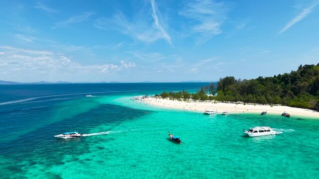 Many tourists enjoying their holiday on Bamboo Island in Krabi province