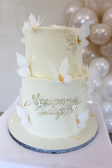 A beautiful cake with an angel for a baptism.