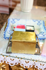 A box with church supplies for the baptism ceremony.