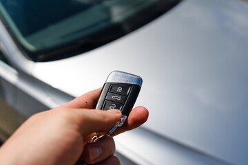 Unlocking a Silver Car with Remote Key Fob