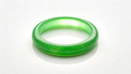 Elegant Green Jade Ring with a Smooth Translucent Finish on a White Background