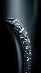 Close-up of Elegant Black Wood Carving Detail with Leaf Pattern