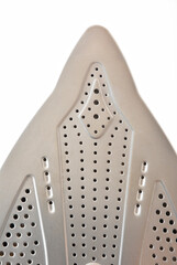 Detail of tip of metal soleplate of a steam iron