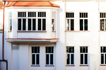 external vintage design style architecture facade of living villa house with white wall windows and...