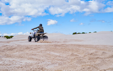 Panorama: Electric quad bike in action on white sand dunes, Atlantis, South Africa © Arnold