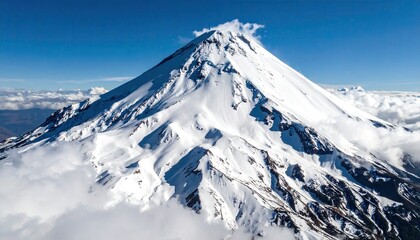 Snowy mountain peak, clear sky