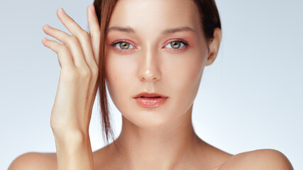 Macro Portrait Of Young Woman With Radiant Complexion And Nude Makeup
