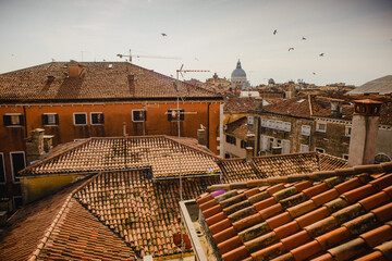 Panoramic view of the tiled roofs of Venice. Italy is typical