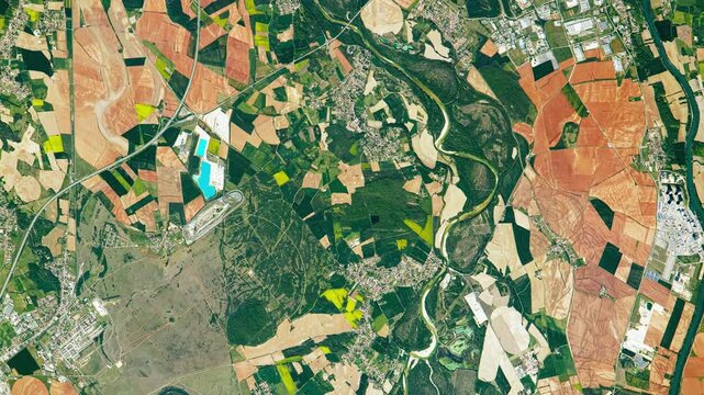 Aerial perspective on  fertile land and soil, agricultural district. Camera is moving left. Animation based on image by NASA