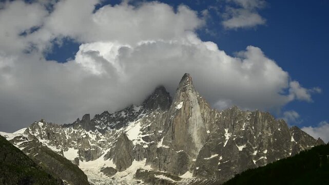 Timelapse of clouds rolling over the jagged peaks at the Aiguille du Midi and Mont Blanc