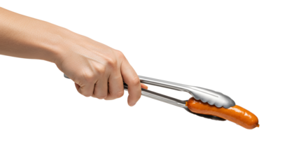 Hand holding sausage with tongs against white background during grilling