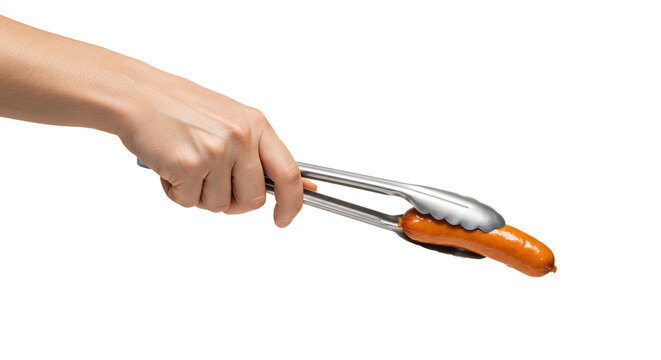 Hand holding sausage with tongs against white background during grilling