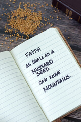 Faith as mustard seed can move mountains, inspirational handwritten quote in notebook with holy...