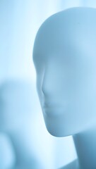 Stock photo of mannequin head for fashion design and retail display in soft blue tone