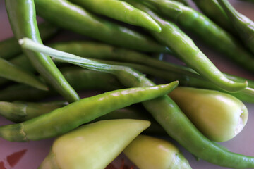 green hot peppers and yellow pickling peppers