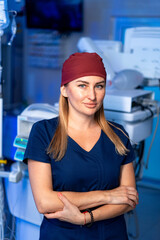 Health pro in modern clinic. A confident healthcare worker stands in a well-equipped clinic,...