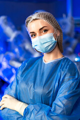 Surgeon gets ready for surgery. A qualified medical professional stands confidently in a surgical...