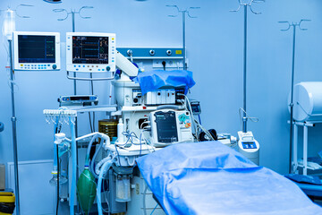 High-tech operating room. A modern operating room with advanced equipment and a surgical table, ready for a sterile procedure.