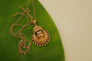 Indian gold necklace traditional jewelry ethnic ornate design cultural heritage precious metal luxury accessory bridal wedding
