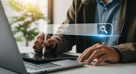 Photo of a person uses a stylus on a tablet with a search bar interface, representing online research, data discovery, and digital information access